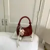 Bolso bandolera de un solo hombro individual elegante y moderno, bolso casual de primavera para mujer, nuevo lanzamiento 2026, bolso tipo bollo de nicho de moda