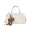 Colección de otoño retro de color sólido para mujer 2026, nueva y moderna, con un elegante bolso cruzado de cadena de color sólido y textura