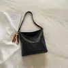 Bolsa tipo cubo texturizada de moda casual de nicho con patrón tejido, modelo nuevo de verano 2026 para trabajo y desplazamientos, bolso de hombro para mujer