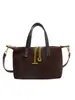 Bolso para Mujer 2026 Nuevo Modelo Nicho Rayas Mezclilla Forma de Dumpling Retro Simple Bolso de Mano Gran Capacidad Bolso de Hombro