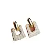 Joyería Transfronteriza Nicho Colgante de Alta Gama Pendientes Accesorios Pendientes de Lujo Ligero Piedra de Perro Estilo Coreano Pendientes Elegantes Mujer