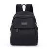 Mochila de mujer bolsa de tela de nailon nueva moda simple mochila escolar mini para damas ocio viaje mochila pequeña venta al por mayor