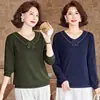Suéter tejido de punto tipo pullover de nuevo estilo moderno con cuello camisero, prenda exterior a la moda y casual para mujeres de mediana edad y mayores.