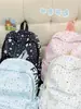 Mochila de estilo coreano de nicho con estampado de estrellas para estudiantes de secundaria y preparatoria, modelo nuevo 2026, mochila estilo bosque para estudiante universitario