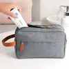 Bolsas de higiene pessoal e necessaires Yuanding estão em estoque, prontas para serem impressas em lotes de 50 ou mais. As bolsas de higiene pessoal catiônicas de segunda geração para homens e mulheres são adequadas para armazenamento em viagens.