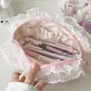 Bolsa de maquillaje con ribete de encaje, bolsa de aseo portátil de gran capacidad para viajes, bonita bolsa de almacenamiento de maquillaje, estuche para lápices de alta apariencia