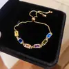 Pulsera tipo jaladera con colgante redondo de circón de colores, pulsera de lujo ligero, sensación de alta gama, pulsera de temperamento lujoso, pulsera versátil, venta al por mayor