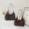 Bolso de mujer de gran capacidad, versátil para otoño, nuevo bolso de hombro de moda 2026, retro casual, adecuado para la escuela y el trabajo, bolso tipo empanada