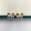 Joyería Hecha a Mano DIY Montura Vacía Aretes de Perla para Mujer Tachuelas Accesorios Exquisito Moño Negro Joyería Comercio Exterior Mayoreo