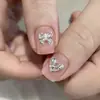 Acessório de strass para nail art em zircônia chanfrada 5A triangular, popular online, strass para unha mini de fundo chato 3mm com design de laço