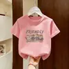 Camiseta de Algodão Puro de Manga Curta para Meninas 2026 Novo Estilo de Verão Top de Algodão Puro para Menininhas Roupas de Verão Estilosas de Meia-Manga para Crianças Ins