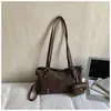 Bolso de hombro retro con acabado mate para mujer, nuevo estilo 2026, versátil para ir al trabajo, bolso bandolera de moda, bolso elegante para debajo del brazo, bolso baguette con un toque de alta gama