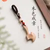 Nuevo colgante de madera de durazno estilo chino, adorno para cadena de teléfono móvil, amuleto de madera para bolso, colgante de paz, accesorio de estilo tradicional chino, llavero, colgante pequeño