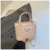 Bolso de Encaje Lindo para Mujer 2026 Nuevo Estilo Ins Versátil Bolso Cubo para el Trabajo Elegante Bolso de Hombro Cruzado