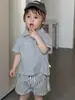 Ropa de Verano para Niños Estilo Coreano Ropa para Niños Ropa para Bebés 2026 Nuevo Estilo Traje de Camiseta de Manga Corta y Shorts para Niños Venta al por Mayor Personalización
