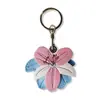 Colgante de Flor de Lirio de PU, Portatarjetas de Acceso, Funda Protectora para Airtag, Bolso, Llavero para Coche, Merchandising de Mayday