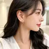 Pendientes dobles minimalistas de plata con incrustaciones de diamantes para mujer, pendientes de nicho elegantes y de lujo ligero, pendientes de aro exquisitos con un sentido de lujo y sofisticación