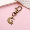 Mezcla de 20 colgantes pequeños de color bronce retro, bonitos colgantes de gato con forma de garra de gato, accesorios de joyería DIY.