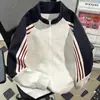 Top unisex de estilo retro americano con bloques de color y rayas, cuello alto, manga raglán, chaqueta simple y versátil