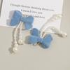 Pendientes elegantes de borlas largas con lazo de perlas para mujer, hechos a mano, con cuentas trenzadas, para principios de otoño, venta al por mayor