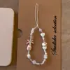 Estilo Little Red Book Teléfono Cadena para Teléfono Kt Lanyard DIY Llavero Cuentas Cámara CCD Linda Correa Cadena Nueva Colgante