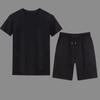 Traje deportivo de verano al por mayor de fábrica para hombre, pantalones holgados de manga corta con cuello redondo y talla grande a la moda juvenil