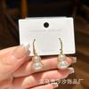 Corea del Sur Dongdaemun Nuevo Zircón Micro-incrustado Perla Calabaza Elegante Moda Sentido del Diseño de Lujo Ligero Aretes