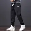 Calça Comprida Casual Fashion Solta Nova Primavera/Outono 2026 Masculina, Calça Jogger Estilo Harem, Calça Comprida Esportiva Tendência para Homens
