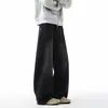 Jeans de hombre deconstruidos 2026 estilo nuevo rectos holgados de pierna ancha pantalones de alta calle americanos versátiles de moda pantalones casuales