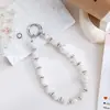 Pingente de Celular Estrela e Flor Delicado Chaveiro Curto com Miçangas Feito à Mão Pingente Fofo para Bolsa que Atrai Sorte