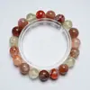 [Atardecer Rosa Naranja] Cristal Natural Negro Oro Super Siete Flor Roja Pegamento Pulsera para Mujer Más Fácil de Combinar Pulsera de Regalo Al por Mayor