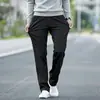 Pantalones casuales rectos holgados de algodón puro de alta gama populares para hombre, pantalones de negocios elásticos versátiles de pierna ancha de moda para el otoño de 2026