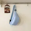 Nova Bolsa de Ombro Casual de Lona Outono 2026 para Mulheres, Bolsa Transversal, Bolsa de Peito Esportiva, Bolsa de Cintura Versátil de Nicho, Bolsa Feminina no Atacado