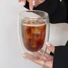 Copo térmico de vidro transparente em formato de ovo com dupla camada, ideal para leite, café, suco e outras bebidas. Feito em vidro borossilicato de alta qualidade.