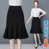 Falda de boutique para mujer, falda negra de cola de pez con volantes, falda de cintura alta de longitud media que favorece la figura con volantes
