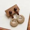 Pendientes de borla con carcasa de madera marrón transfronterizos europeos y americanos, pendientes de estilo vintage Maillard, pendientes de mujer de lujo ligero de alta gama