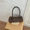 Tendencia de moda 2026: bolso de axila retro, minimalista y único, una nueva colección de verano con bolsos de hombro texturizados y elegantes para mujer