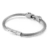 Pulsera de acero de titanio con calavera de personalidad dominante de AliExpress, pulsera retro gótica de doble calavera con alambre de acero al por mayor