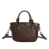 Bolsa de Mão Retro Design de Nicho Bolsa Concha Feminina 2026 Novo Estilo Bolsa para o Dia a Dia Versátil Casual Bolsa de Ombro Transversal