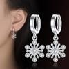 Pendientes de copo de nieve chapados en plata, versión japonesa y coreana, elegantes pendientes de niña súper hada, pendientes largos, distintivos y combinables para mujer.