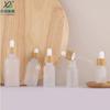 Fabricantes de botellas de vidrio con sello de punto, tubo de bambú para fregar, botella de aceite, botella con tapa de bambú, botella fragante, contenedor de vidrio