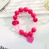 Llavero colgante de cadena de cuentas de colores INS con forma de flor, correa de muñeca creativa y fresca, universal para teléfonos móviles y bolsos