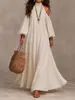 Ropa de mujer transfronteriza europea y americana, vestido largo suelto de color liso, hombros descubiertos, cuello alto, cuello halter, manga abullonada, adelgazante