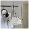 Bolsa de bowling estilo coreano de nicho para mulheres, novo modelo 2026, poá, grande capacidade, ombro único, adequada para o trajeto diário, bolsa almofada da moda tendência