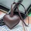 Chaveiro de Couro em Formato de Coração 3D em Estoque, Pingente Simples de Couro Pelúcia em Formato de Coração para Bolsa, Pingente de Couro para Comércio Transfronteiriço