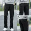 Pantalones casuales rectos holgados de algodón puro de alta gama populares para hombre, pantalones de negocios elásticos versátiles de pierna ancha de moda para el otoño de 2026