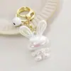 Chaveiro de acrílico de coelho de desenho animado pingente criativo LOVE casal acessórios de chaveiro de mochila pequenos presentes atacado