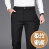 2026 Pantalones Casuales Rojos Nuevos para Hombre, Verano Delgados Ajustados Rectos, Elásticos, Caída Suelta, Sin Planchar, Pantalones de Vestir para Hombre