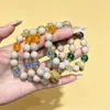 Artículo popular en transmisión en vivo de nuevo producto: Pulsera de porcelana y vidrio con ceniza de incienso de Pekín, pulsera de mano de porcelana con ceniza de incienso del pequeño libro rojo para hombres y mujeres