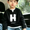 Top de manga larga con patrón de gofre de moda, estilo dos piezas falsas, para niños mayores, estilo coreano, casual y elegante, capa base